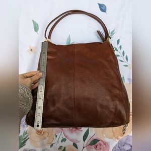 NWOT Brown/Tan leather Coach Brand women's slouch style shoulder purse 6x12x12